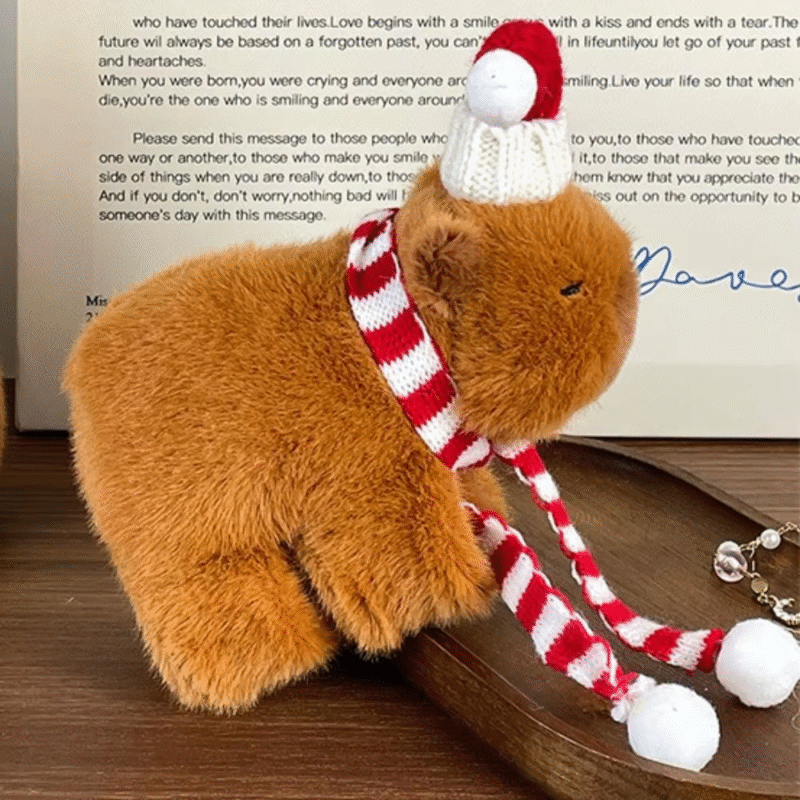 Caption the Toy Slap Snap Christmas Hat capybara with Adorable Fluffy and delightful Winter Clapping Circle Freak and kids would lose track of time and meticulousness as the plush capybara bop bracelet capes unbelievably - Image 2