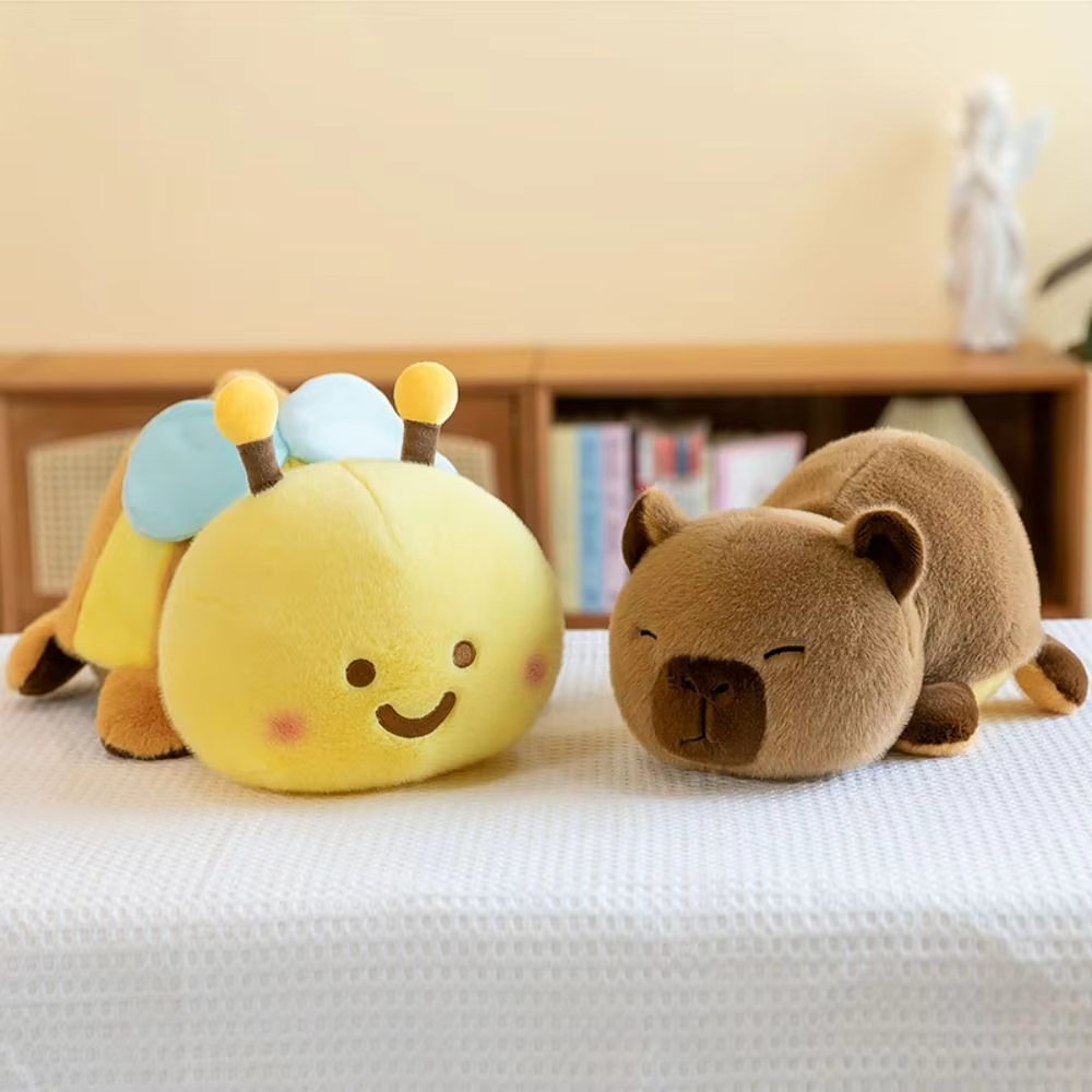 A delightful two-in-one plush toy, The R6FD Long Lasting Double Sided Stuffed Capybara Plush Toy (30 cm) has capybara and a soft bee plush toy on the other side