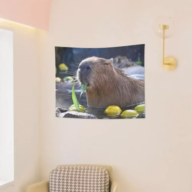 This 200x150 cm Capybara Tapestry Wall Hanging is a fantastical. it can be used as a bed cover, a cute rug, or framed to create an adorable wall feature that will warm up the entire room.
