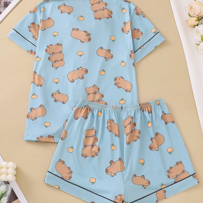 Women's cute pajamas set with a blue background, loose capybara pajamas, and a short sleeve top with a capybara cardigan.